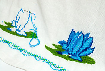 Image showing unfinished embroidered serviette by cross-stitch pattern