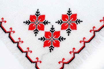 Image showing part of embroidered serviette by cross-stitch pattern