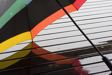 Image showing Black umbrella with rainbow colors