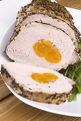 Image showing Roasted pork loin with dried apricots