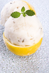 Image showing lemon sorbet with lavender in cups of lemon