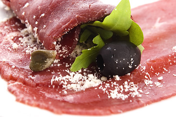 Image showing Beef carpaccio with rucola and parmesan 