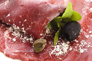 Image showing Beef carpaccio with rucola and parmesan 