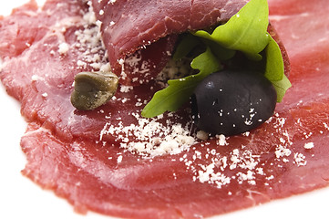 Image showing Beef carpaccio with rucola and parmesan 
