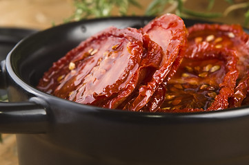 Image showing Sun dried tomatoes with olive oil