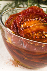 Image showing Sun dried tomatoes with olive oil