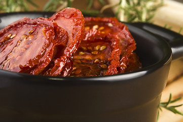 Image showing Sun dried tomatoes with olive oil