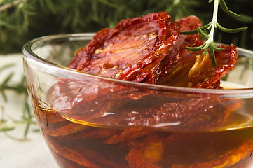 Image showing Sun dried tomatoes with olive oil