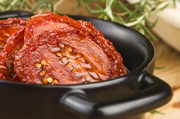 Image showing Sun dried tomatoes with olive oil