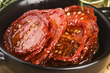 Image showing Sun dried tomatoes with olive oil