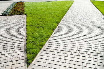 Image showing sidewalk between green grass