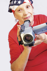 Image showing  grandmama with digital camera