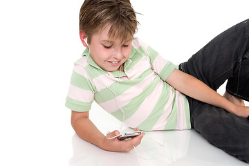 Image showing Child enjoying music