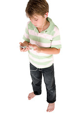 Image showing Child using audio device