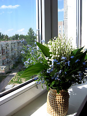 Image showing Bouquet of lilies of the valley and blue flowers