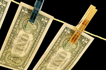 Image showing Dollars on the wire