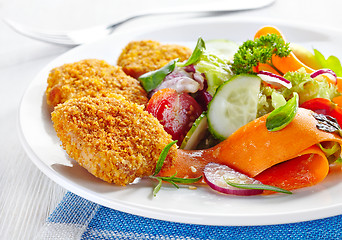 Image showing chicken nuggets and vegetable salad