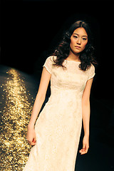 Image showing Asian model on the catwalk