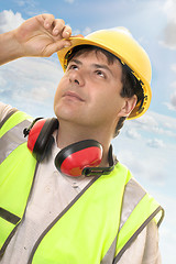 Image showing Engineer or builder looking up at progress