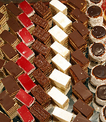 Image showing Colorful desserts and pastry served on a wedding party