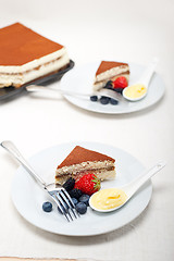 Image showing tiramisu dessert with berries and cream