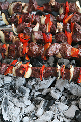 Image showing Over the coals