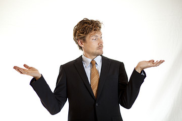 Image showing Businessman showing off two ideas