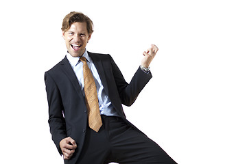 Image showing Successful businessman playing air guitar