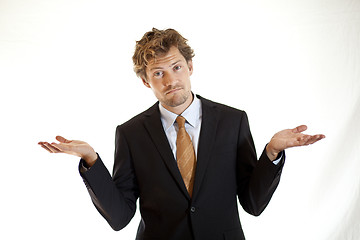 Image showing Bewildered businessman looking confused