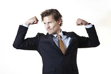 Image showing Flexing businessman