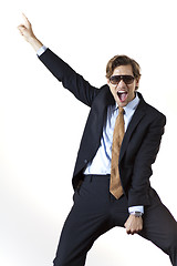 Image showing Cool businessman letting loose