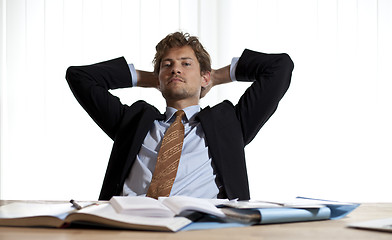 Image showing Businessman realaxing in his chair