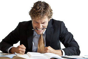 Image showing Angry businessman at desk