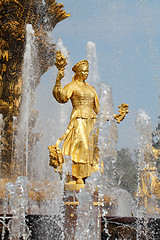 Image showing Girl with a fountain of friendship  Lithuania