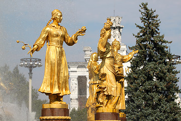 Image showing Girl with a fountain of friendship  Uzbekistan