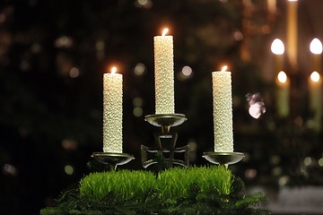 Image showing Burning candles on church altar