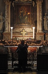 Image showing Women pray at the altar of the Virgin Mary