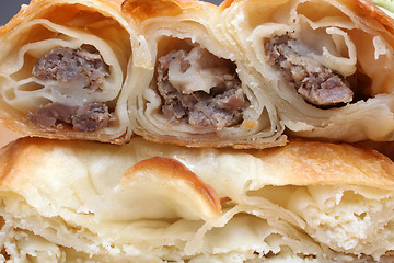 Image showing Burek (pie with meat or spinach) is traditional Balkanian meal 