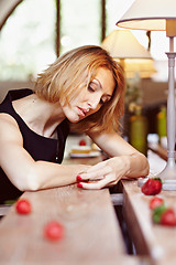 Image showing Girl with strawberries