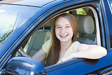 Image showing Teenage girl learning to drive