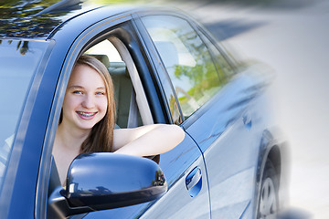 Image showing Teenage girl learning to drive