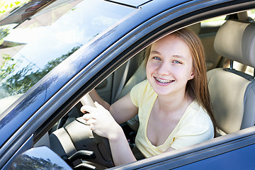 Image showing Teenage girl learning to drive