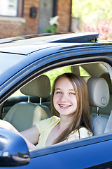 Image showing Teenage girl learning to drive