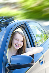 Image showing Teenage girl learning to drive