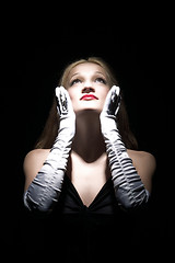 Image showing look up and white gloves