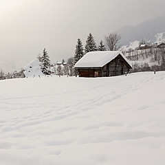 Image showing Barn on Snowy Field