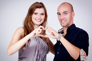Image showing young attractive couple in love embracing portrait