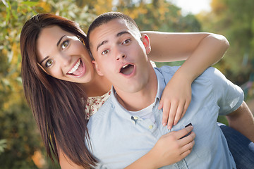 Image showing Mixed Race Romantic Couple Portrait in the Park