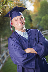 Image showing Handsome Male Graduate in Cap and Gown