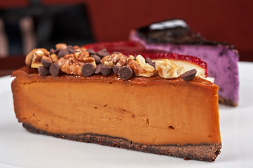 Image showing cheesecake with chocolate and nuts